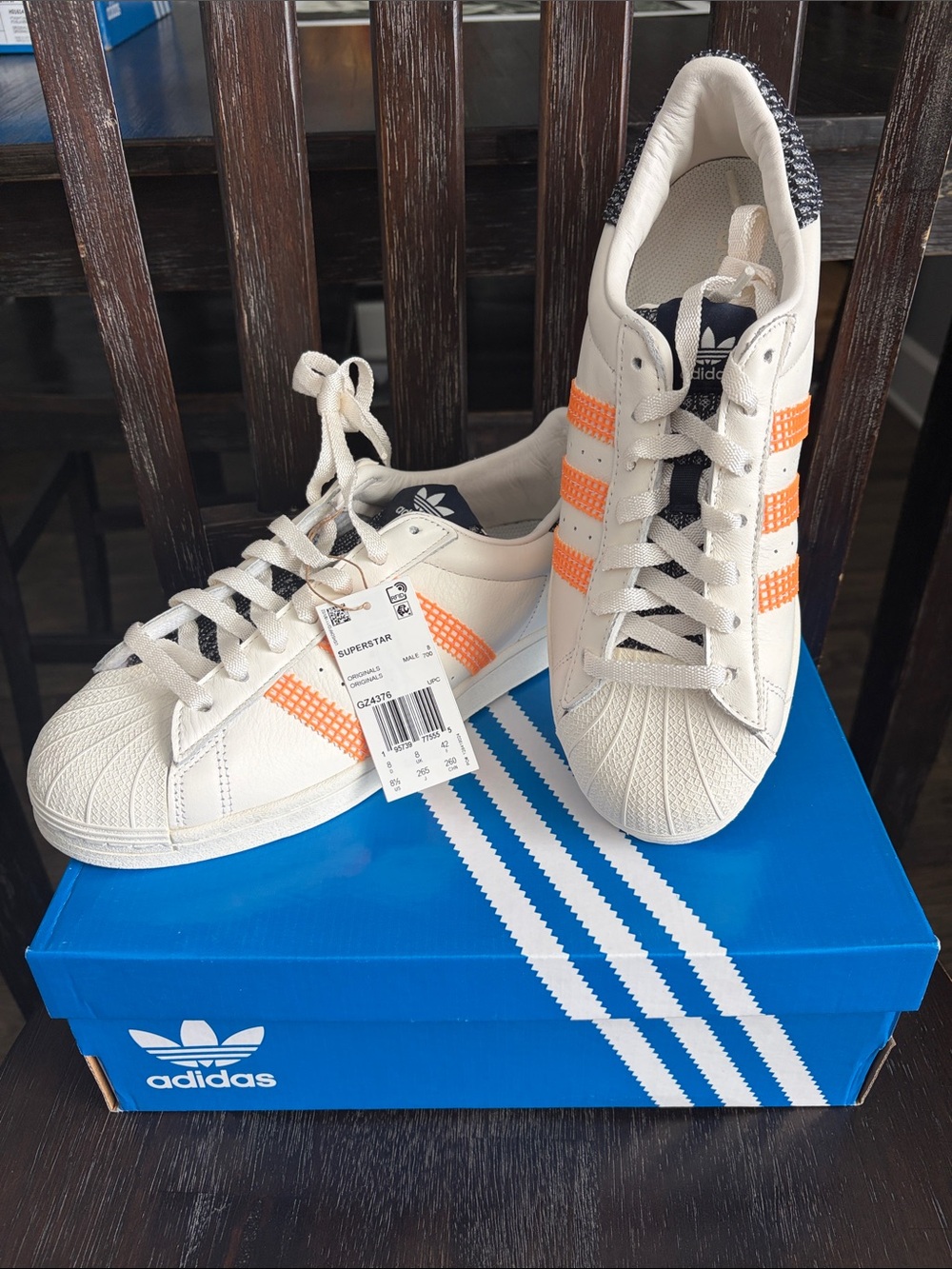 adidas Originals White Superstar Sneakers with Orange Accents